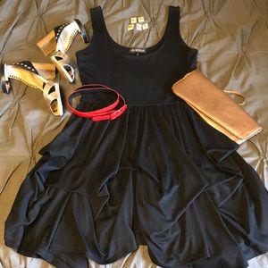 Hot black tank dress w/ unique hemline